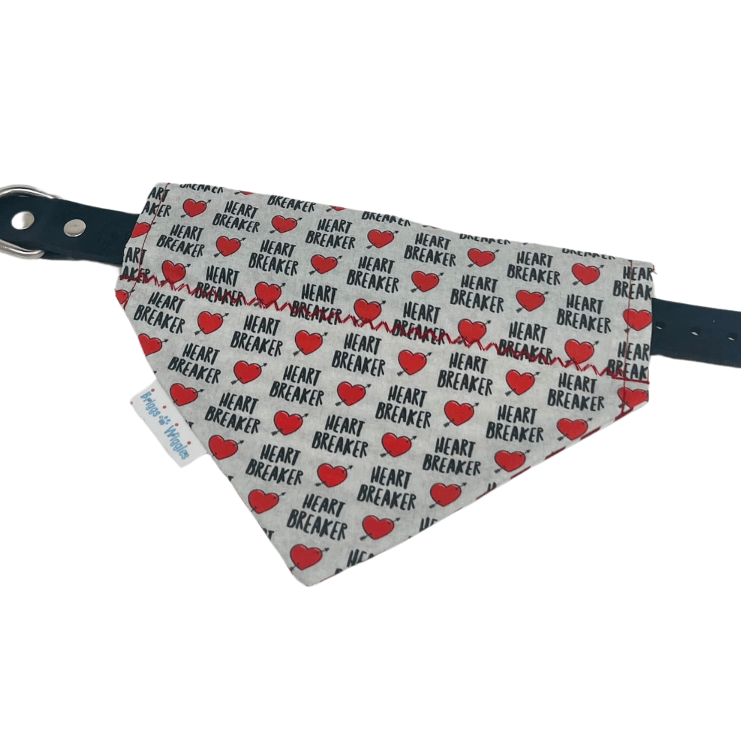 Heartbreaker Valentine's Day bandana on a dog collar, showcasing the gray background with heartbreaker text and Cupid heart design for festive pet fashion.