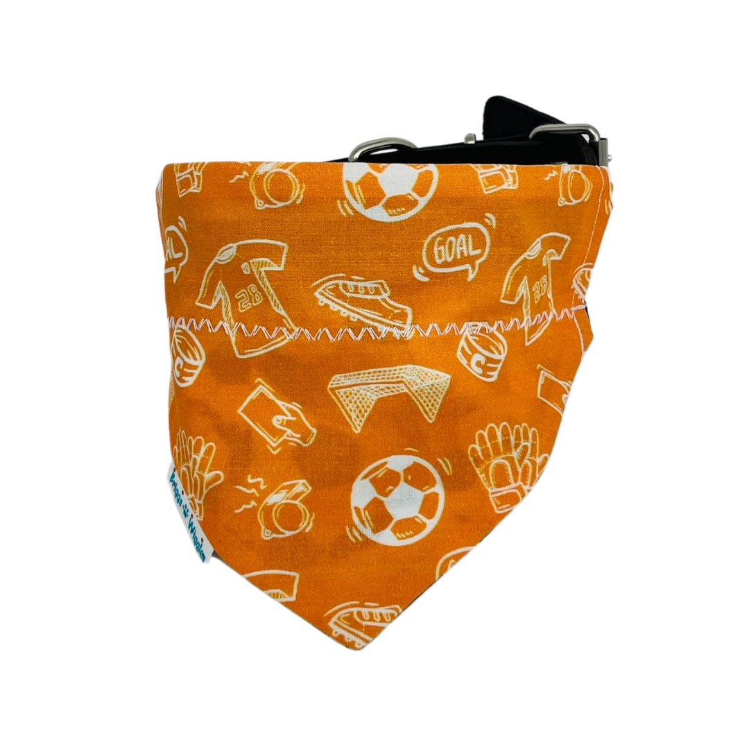 reversible Houston Dynamo inspired dog bandana featuring the front of the bandana with an orange and white design. A must have MLS team pet accessory for Houston soccer-loving dog owners.