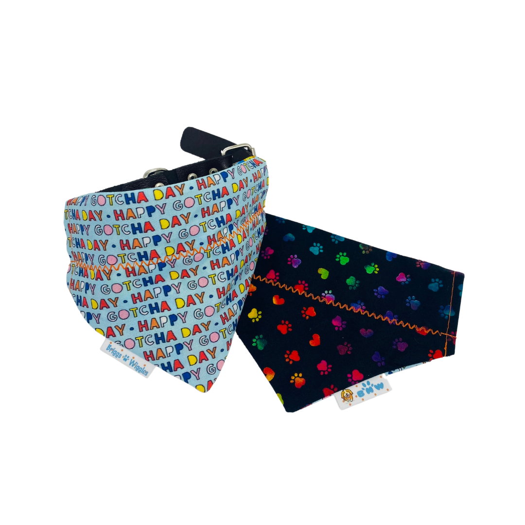 Reversible Gotcha Day Dog Bandana featuring a colorful design celebrating rescue milestones, shown front and back.
