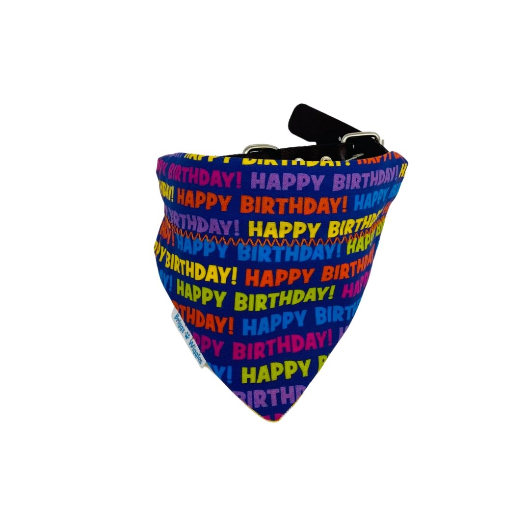 Bright blue Happy Birthday dog bandana with bold, colorful text, ideal for dogs to ear at their birthday or as a fun party accessory.
