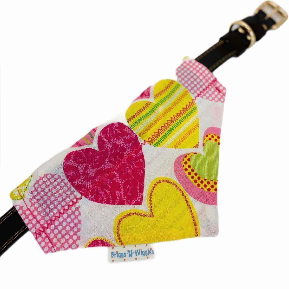 Candy Hearts Valentine's dog bandana displayed on a collar, showcasing colorful heart designs for stylish pet accessories.