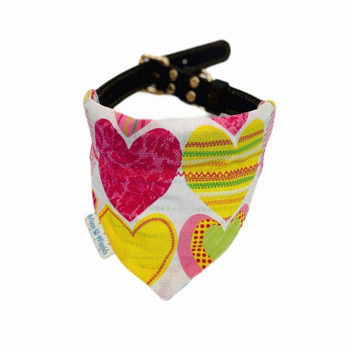 Close-up of Candy Hearts pastel dog bandana featuring pastel colored hearts on a soft background.