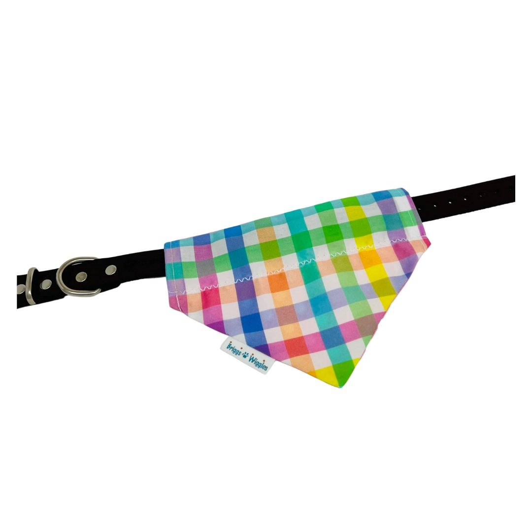 Handmade pastel plaid dog bandana laid flat, showing how it slides onto the collar.