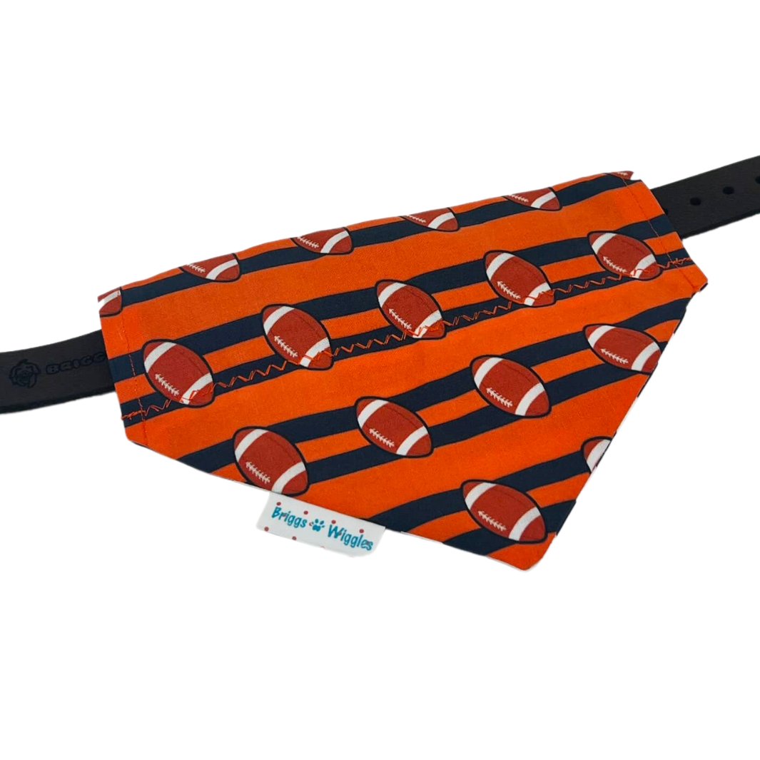 Orange and Blue Football Reversible Dog Bandana. This image is showing slide onto the collar option.