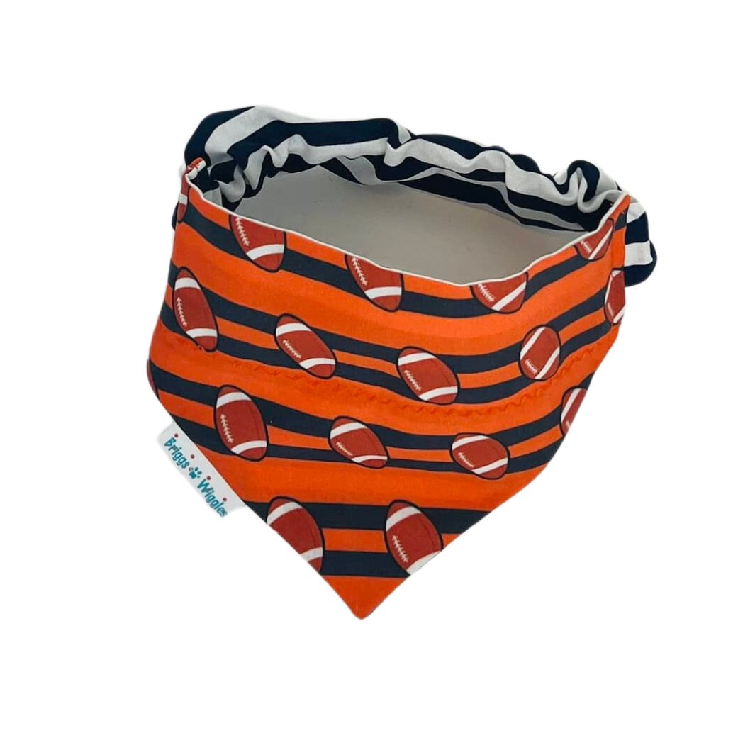 Orange and Blue Football Reversible Dog Bandana. This image is showing the add-on scrunchie option.