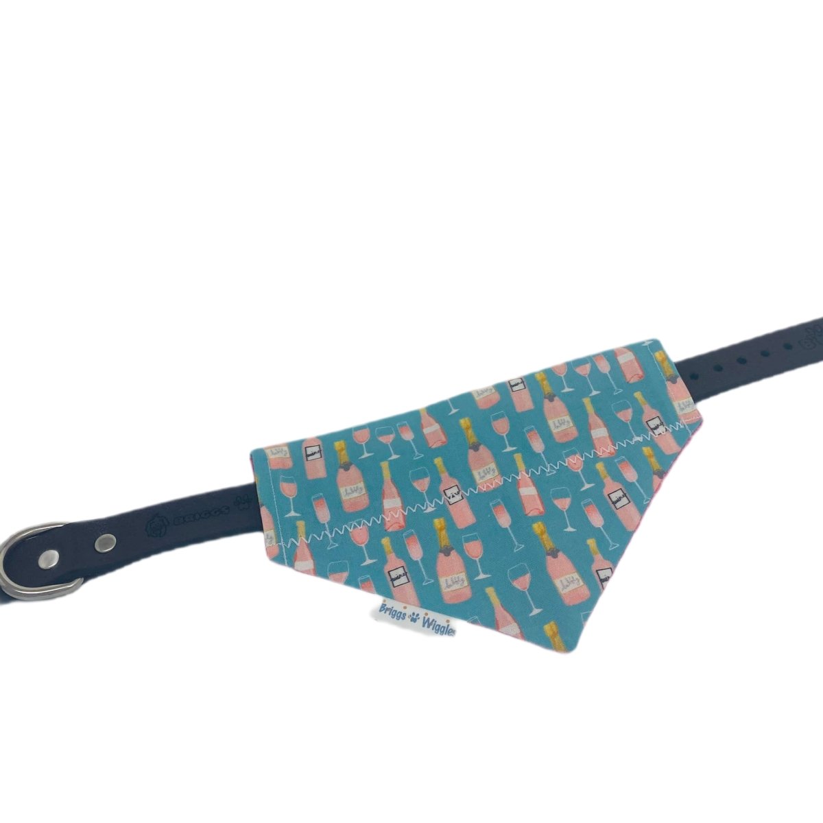 Teal rose All Day reversible dog bandana shown flat on a collar, ready to wear.