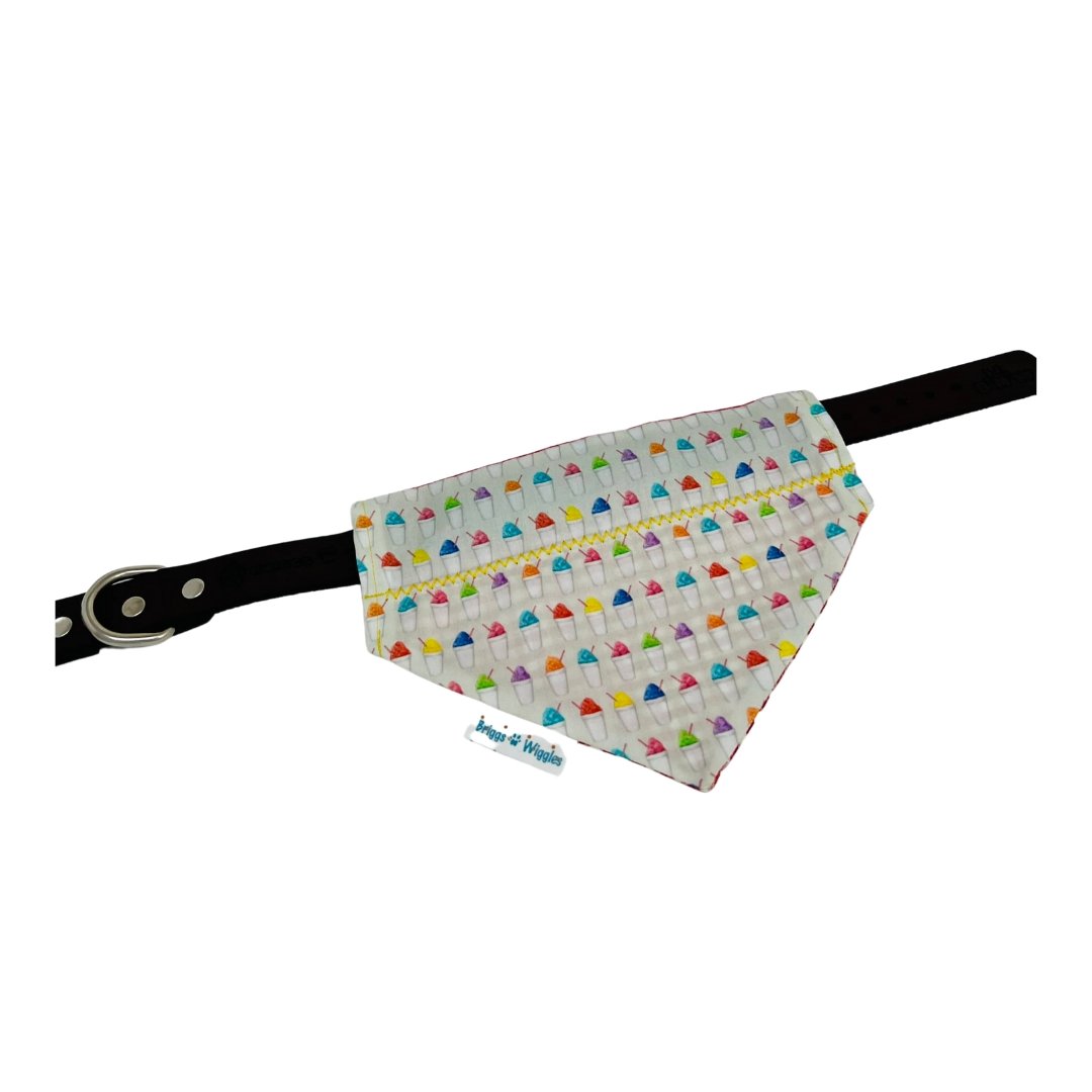 Designed for convenience! The Snowball Fun Dog Bandana is shown flat, highlighting the easy slip-on collar slot for a secure comfortable fit.