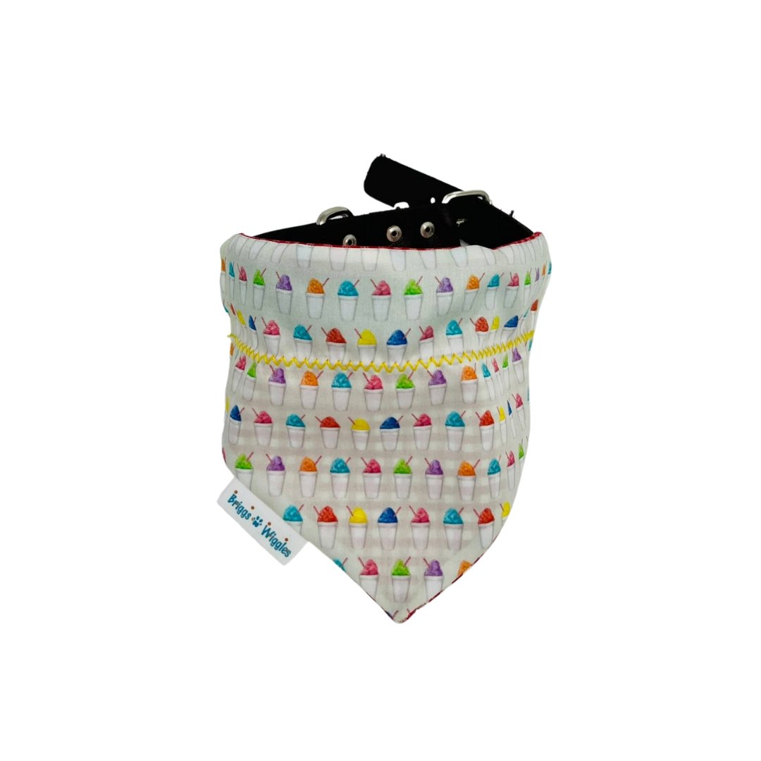 The Snowball Fun Dog Bandana has colorful snowballs, festive for summer outings.