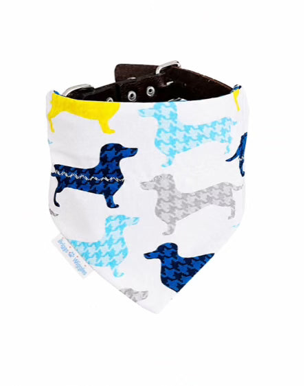 Handmade reversible dog bandana with dachshund print and blue plaid reverse available in five sizes.